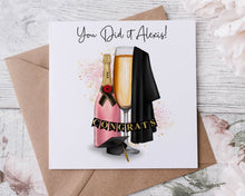 Load image into Gallery viewer, Personalised Graduation Card Congratulations You Did It with Champagne Bottle, Cap and Gown Large or Small Card Gold, Pink or Silver
