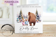 Load image into Gallery viewer, Daddy bear Christmas card with an illustratuon of a daddy bear holding the hand of his baby beard
