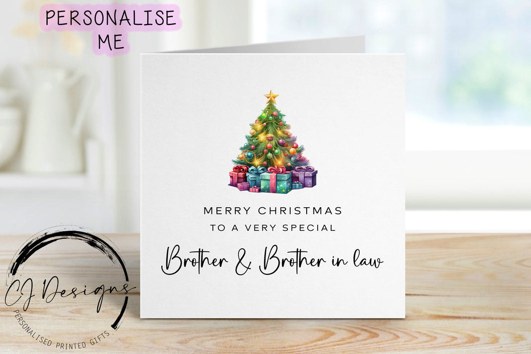 Brother & Brother in law chirstmas card with a picture of a colourful Christmas tree with gifts underneath