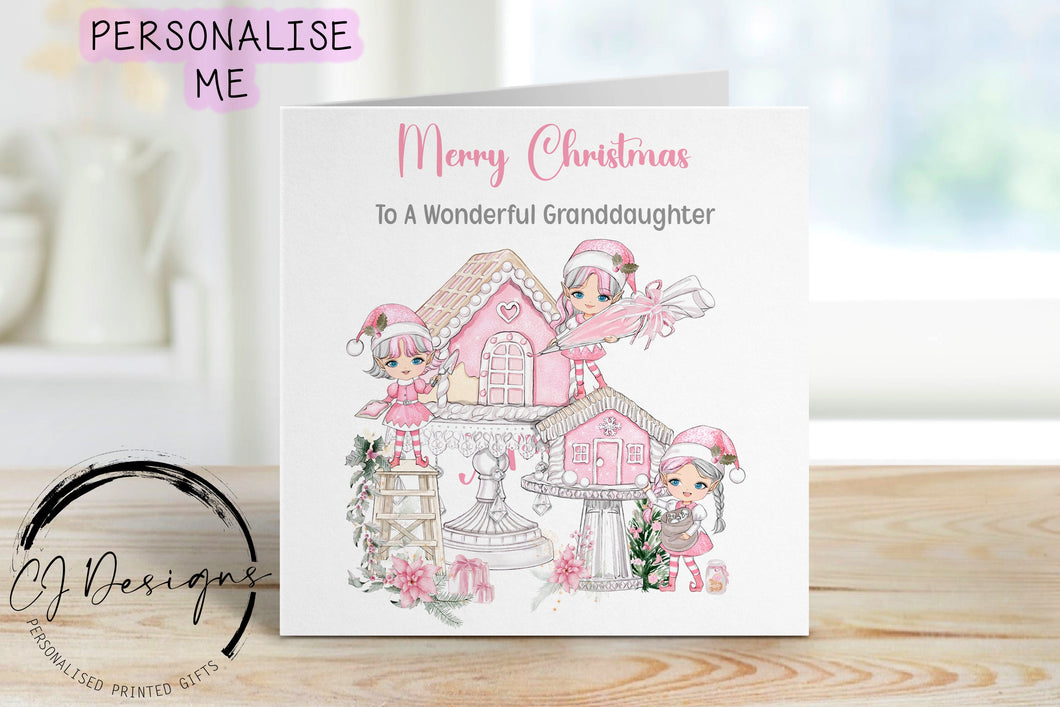 Personalised Granddaughter Christmas Card, with a picture of a pink christmas stocking with a ladder at the side and 3 pink elves filling the stocking with gifts