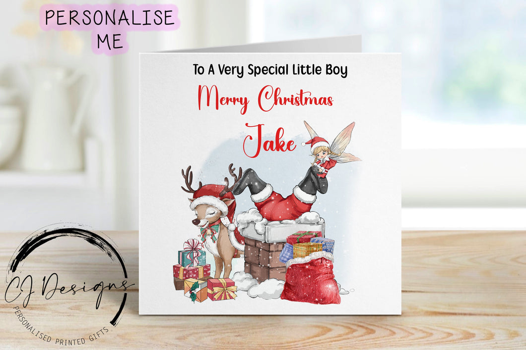 Personalised Little Boy Christmas card, with picture of santa stuck in a chimney with a little girl elf trying to pull him out