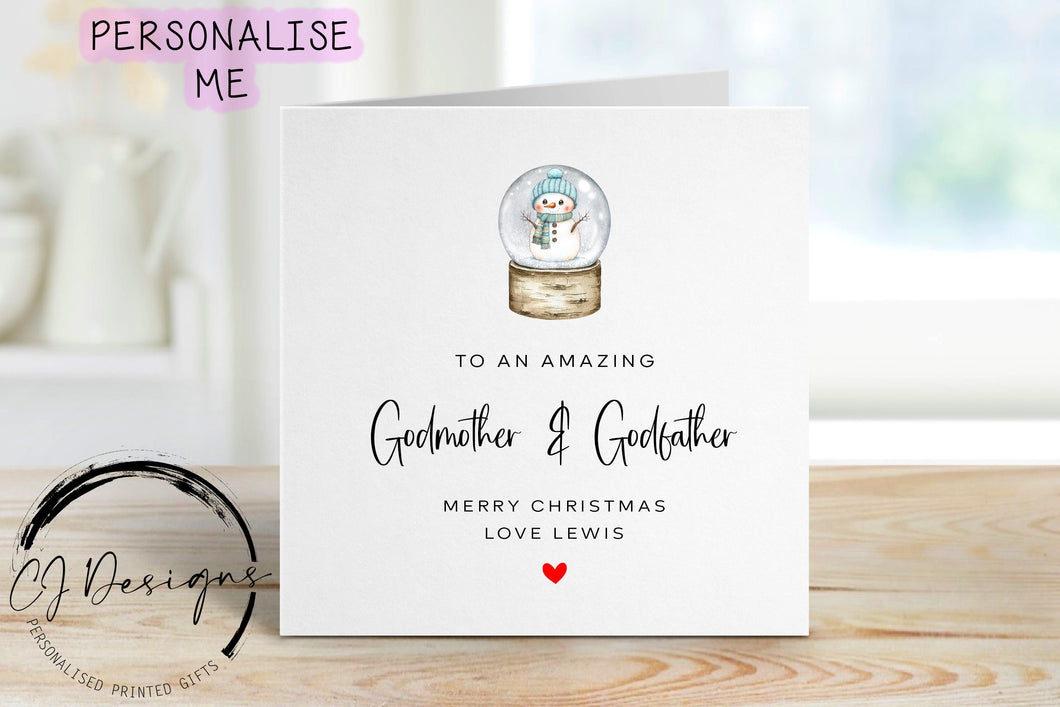 Godmother & Godfather personalised Christmas card with a picture of a snowglobe with a snowman inside waering a blue hat and scarfe