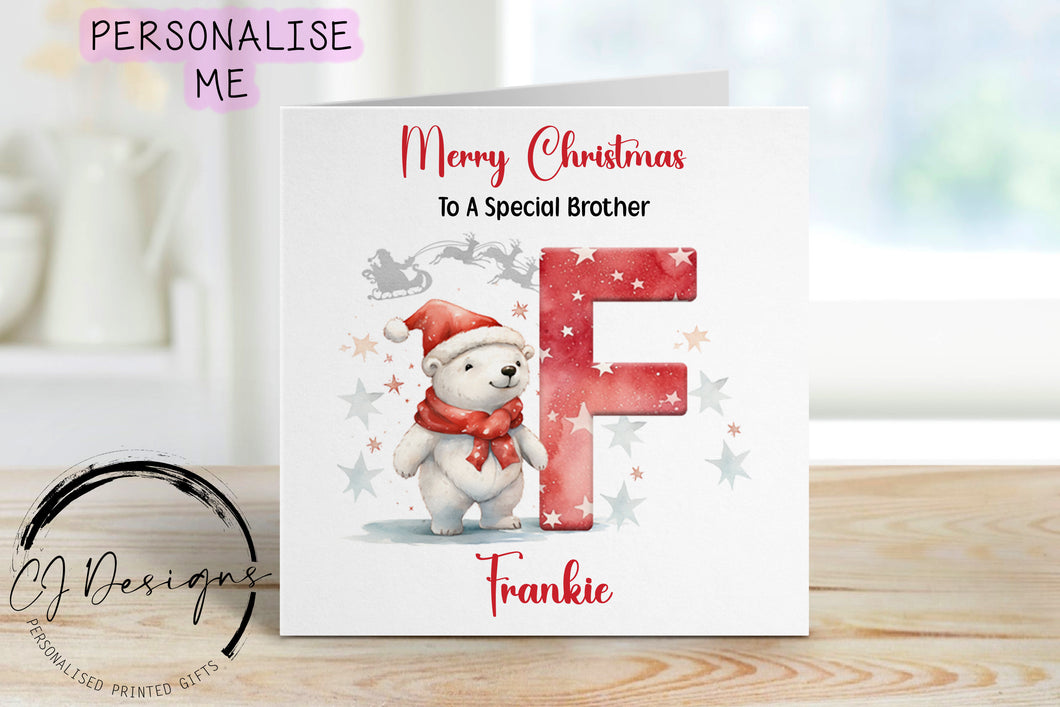 Brother personalised Christmas card with a polarbear wearing a christmas hat stood next to a large red letter which depicts the first letter of your little ones name