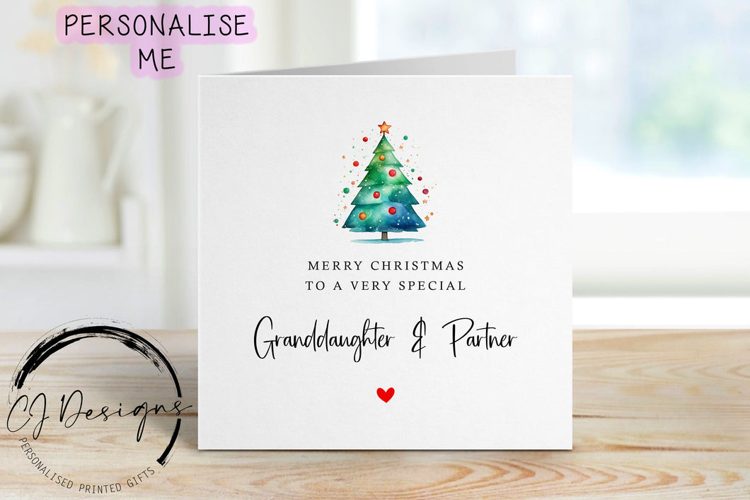 Granddaughter & Partner chirstmas card with a picture of a colourful Christmas tree