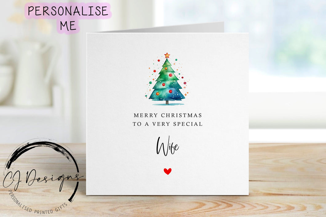 Wife chirstmas card with a picture of a colourful Christmas tree